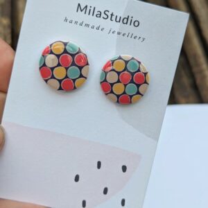 Colourful stud earrings from MilaStudio on a product card.