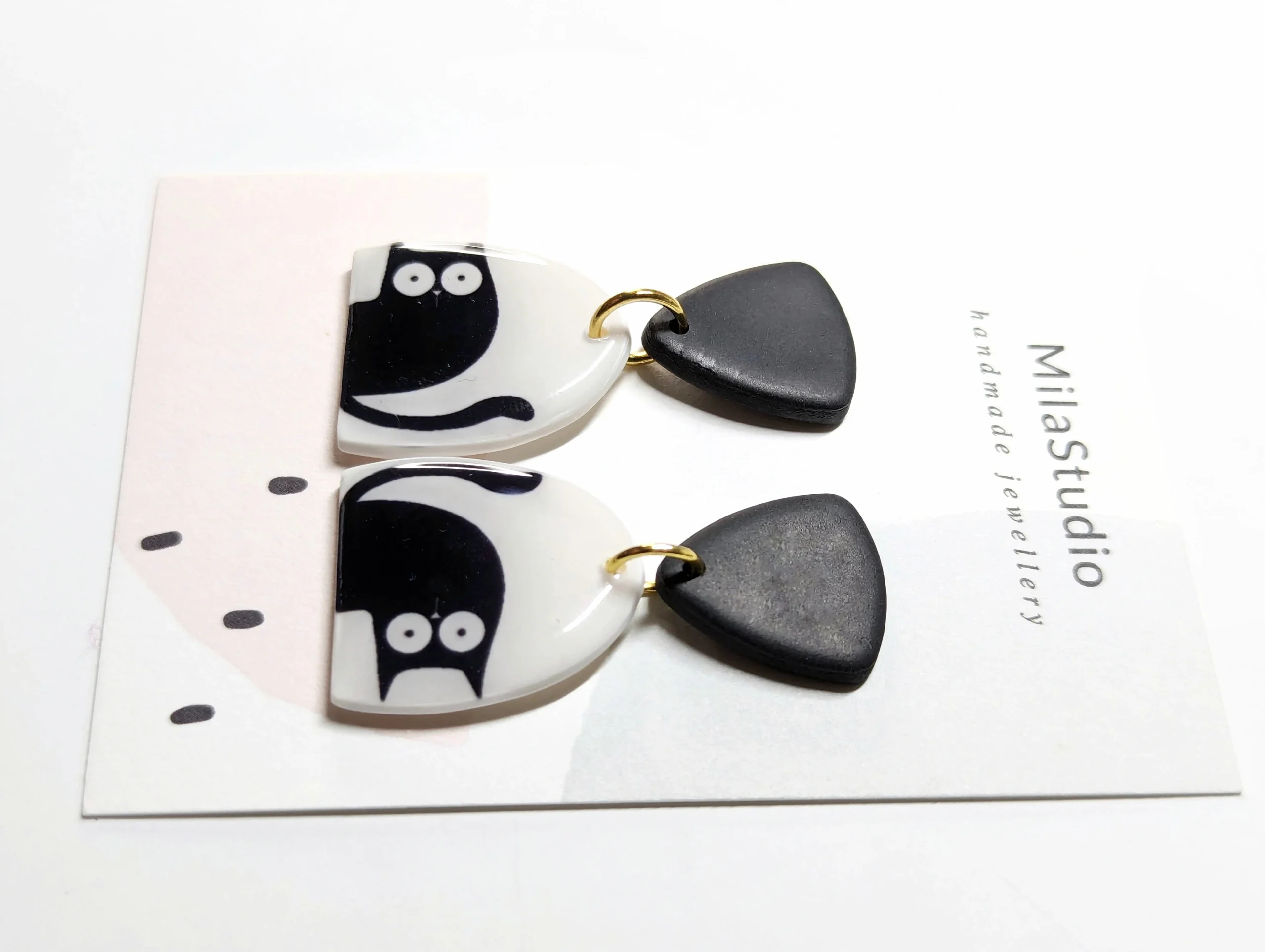 Earrings for cat lovers with cat silhouettes.