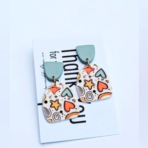 y2k style earrings with hearts and stars